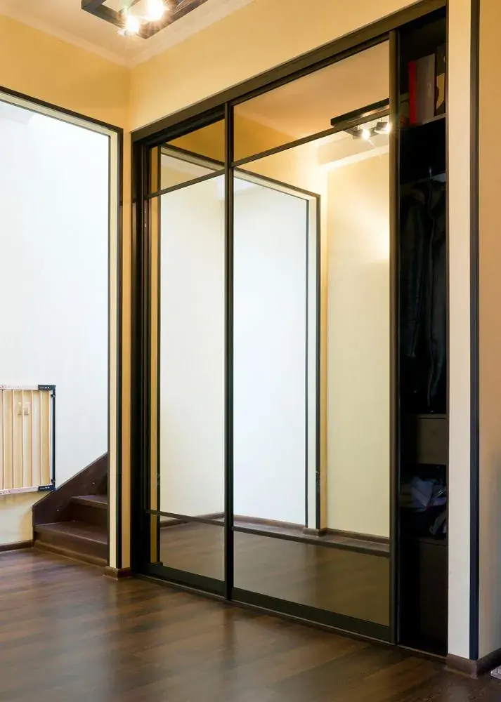 Sliding wardrobe doors with frosted and mirrored panels